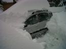 auto sotto la neve dopo